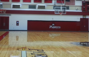 Refinish a basketball court as part of painting your gym